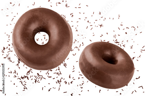 Donuts fly covered with chocolate frosting with chocolate sprinkles isolated on a white background. Funny and delicious dark chocolate doughnuts