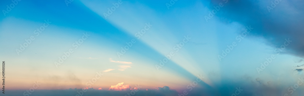 Dramatic Panoramic View of a cloudscape during a cloudy and colorful sunset. Taken over Havana, Cuba.