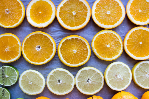 Sliced orange,lemon ,lime. Citrus drying, top view, background, texture