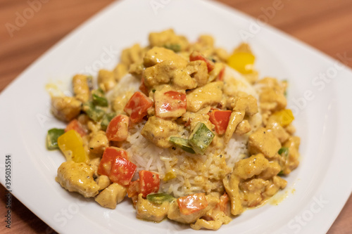 Homemade chicken curry on a plate close up