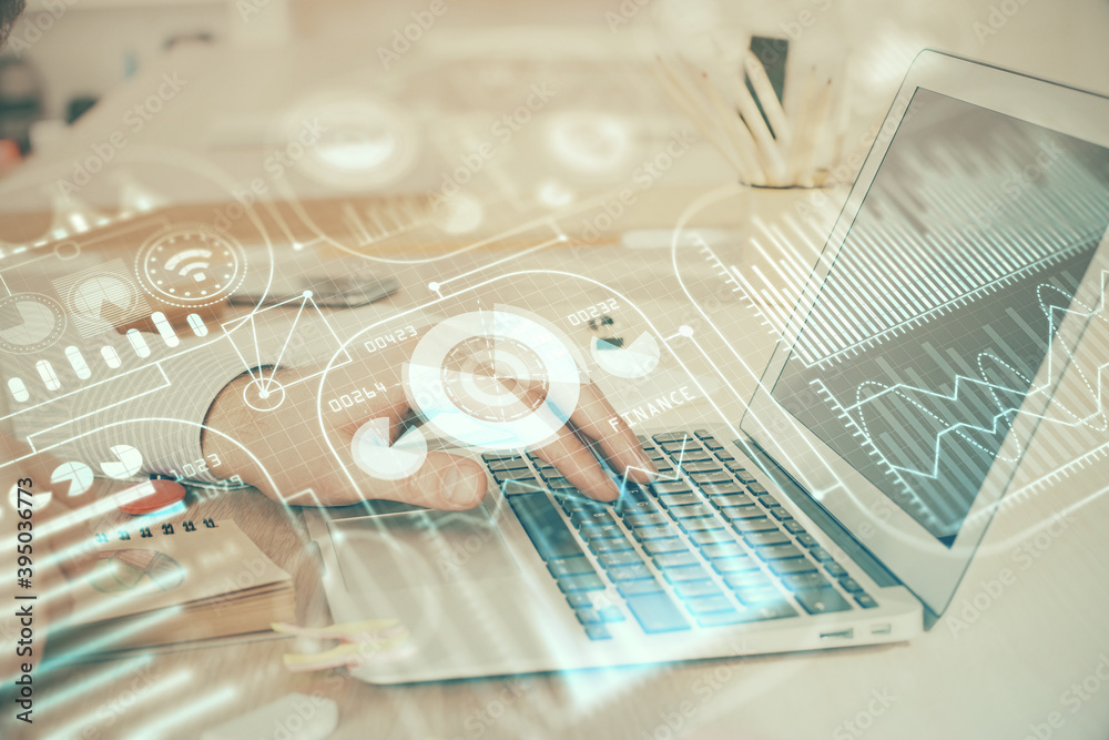 Technology theme hologram with man working on computer on background. High tech concept. Double exposure. Technology theme hologram with man working on computer on background. High tech concept. Double exposure.