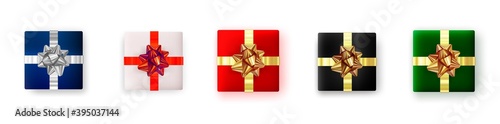 Christmas set red green black white blue gift boxes tied with gold and silver  ribbons, top view. Isolated on white background. For happy new year design, decoration for birthday  festive card.