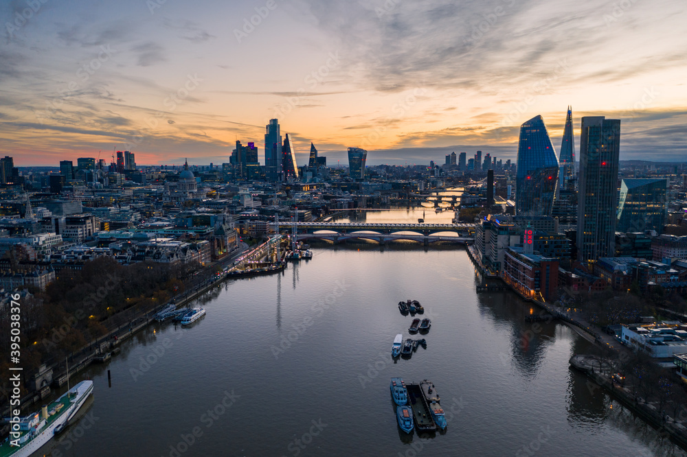 London city skyline from the river thames at sunrise aerial view 