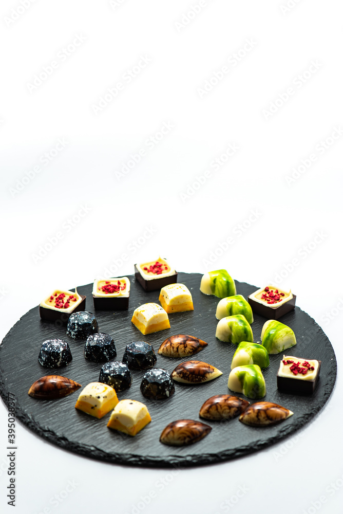 Set of chocolate sweets isolated on white background, selective focus