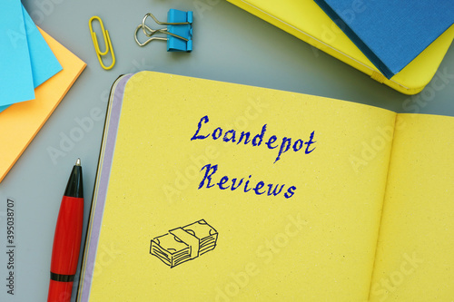 Financial concept about Loandepot Reviews with sign on the sheet. photo