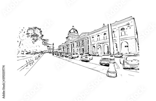 Building view with landmark of Cienfuegosis the 
city of Cuba. Hand drawn sketch illustration in vector.