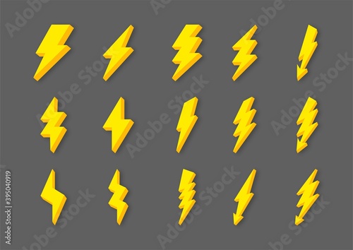 yellow lightning bolt flash and thunder icons set cartoon style isolated on gray background. 