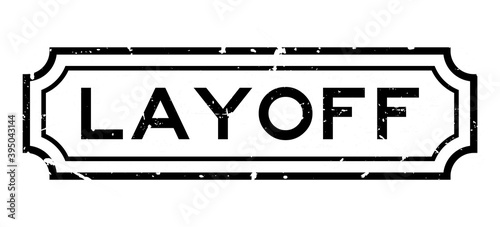 Grunge black layoff word rubber business seal stamp on white background