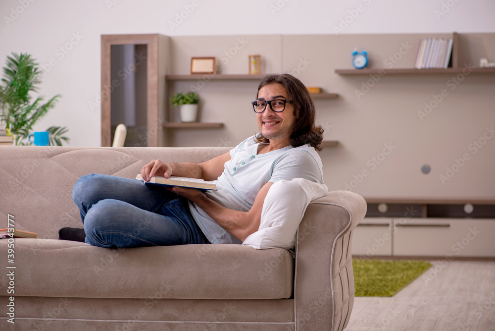 Young male student preparing for exams at home Young male student preparing for exams at home