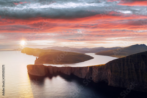 Incredible panoramical view of Sorvagsvatn lake on cliffs of Vagar island in sunset time, Faroe Islands, Denmark. Landscape photography photo