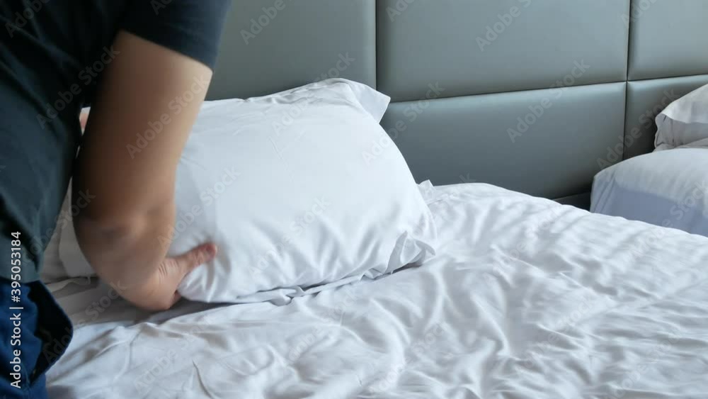 Arrange white bed in bedroom hotel. Bedding Arrange white bed in bedroom hotel. Bedding