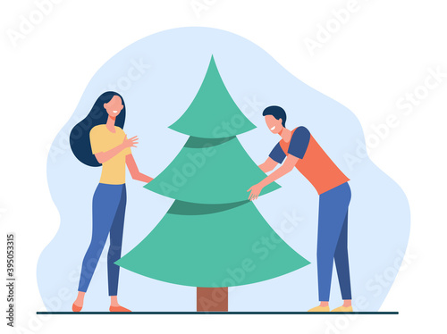 Young couple putting Christmas tree. Happy man and woman celebrating Xmas flat vector illustration. Holiday, December, New Year party concept for banner, website design or landing web page