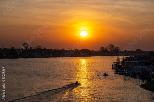 Beautiful Sunset View of Koh Kred at Rama IV bridge cross the Chao Phraya River in Park Kred, Nonthaburi province, Thailand photo