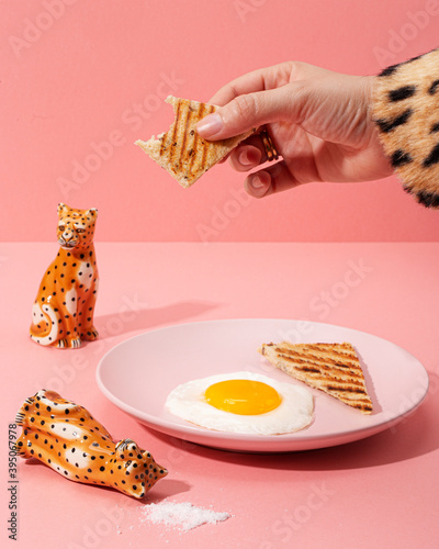 Billede på lærred Breakfast made of coffee, eggs, bread and a tiger