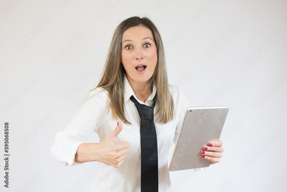 Portrait of surprised business woman holding tablet on white background Portrait of surprised business woman holding tablet on white background
