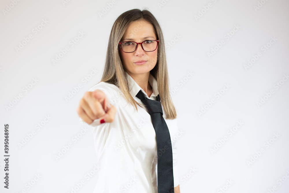 Confident business woman pointing to the camera - isolated over white Confident business woman pointing to the camera - isolated over white