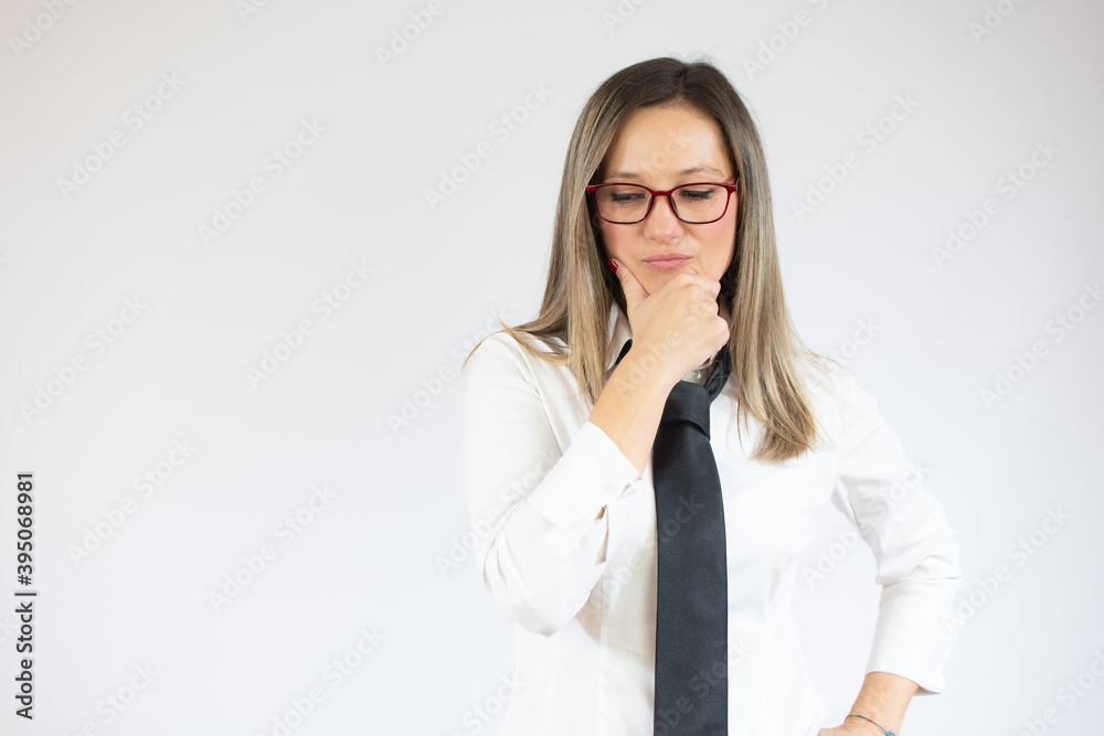 Business caucasian woman thinking on a white background Business caucasian woman thinking on a white background
