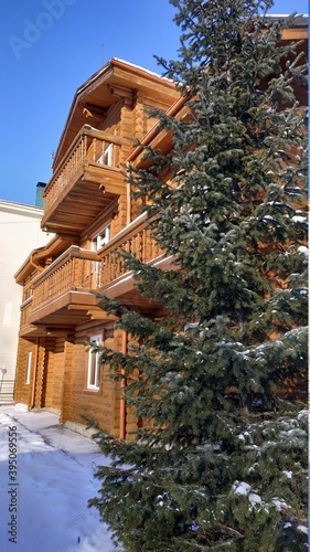 wooden made house in the winter forest
