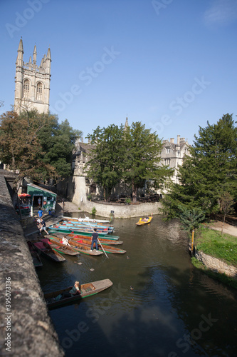 Punting on The River Cherwell in Oxford next to Magdalen College in the UK