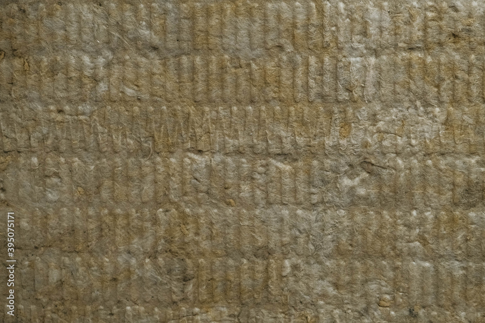 Mineral wool for insulating the walls as a background image texture. Top view. Copy, empty space for text Mineral wool for insulating the walls as a background image texture. Top view. Copy, empty space for text