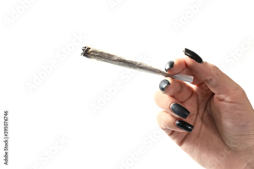 Wallpaper Mural Woman hand holding cigarette isolated on a white background.  Smoking cannabis joint. Medical use. 	 Torontodigital.ca