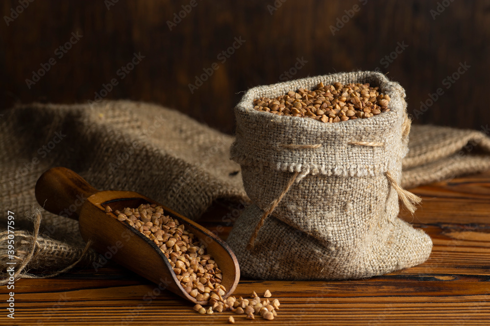 A small linen sack with raw buckwheat. Traditional Russian cuisine. The concept of a healthy diet.