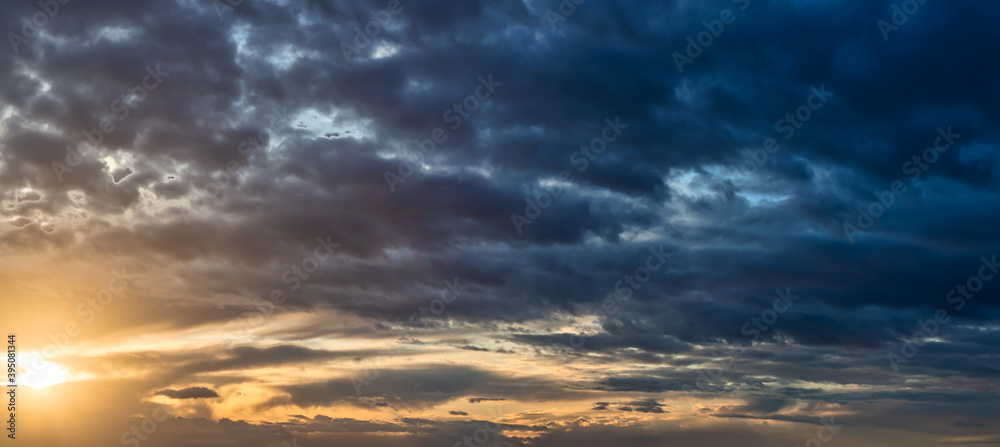 Beautiful Panoramic View of colorful cloudscape during dramatic sunset. Taken in White Rock, Vancouver, British Columbia, Canada.