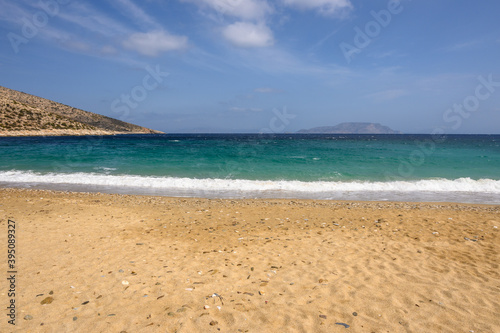 Agia Theodoti beach on Ios Island. A wonderful beach with the golden sand and azure waters. Cyclades, Greece