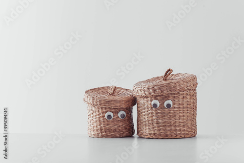 A close up of a two basket with eyes