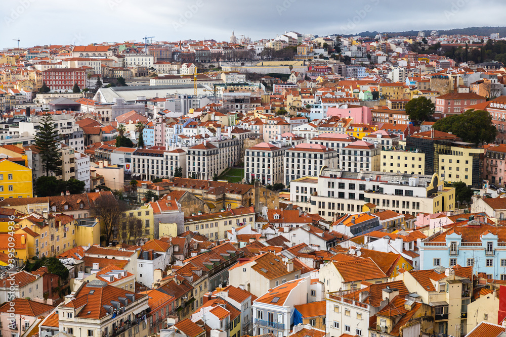 view over the capital of Portugal Lisbon Lisboa colorful buildings with orange roofs 