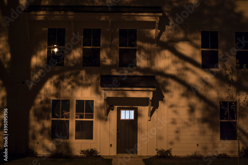 A white house at night in the dark creepy scary