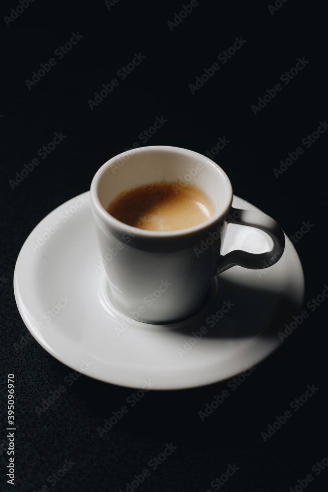 Cup of black coffee/Cup of black coffee on the black background Cup of black coffee/Cup of black coffee on the black background