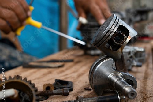 piston and engine parts under repair