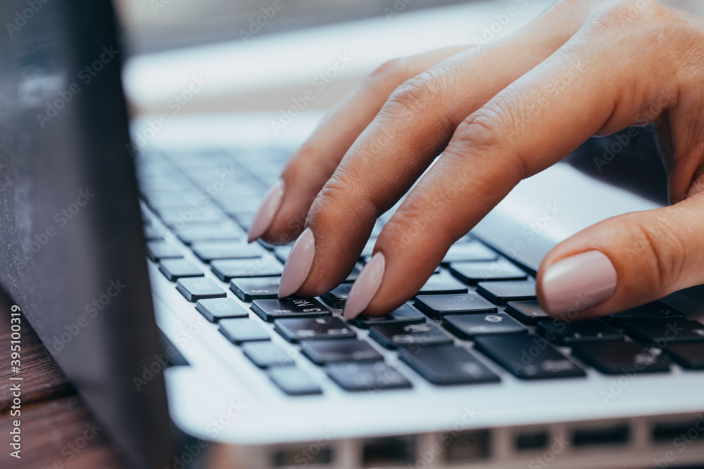 woman using laptop, searching the internet, viewing information, having a job at home woman using laptop, searching the internet, viewing information, having a job at home