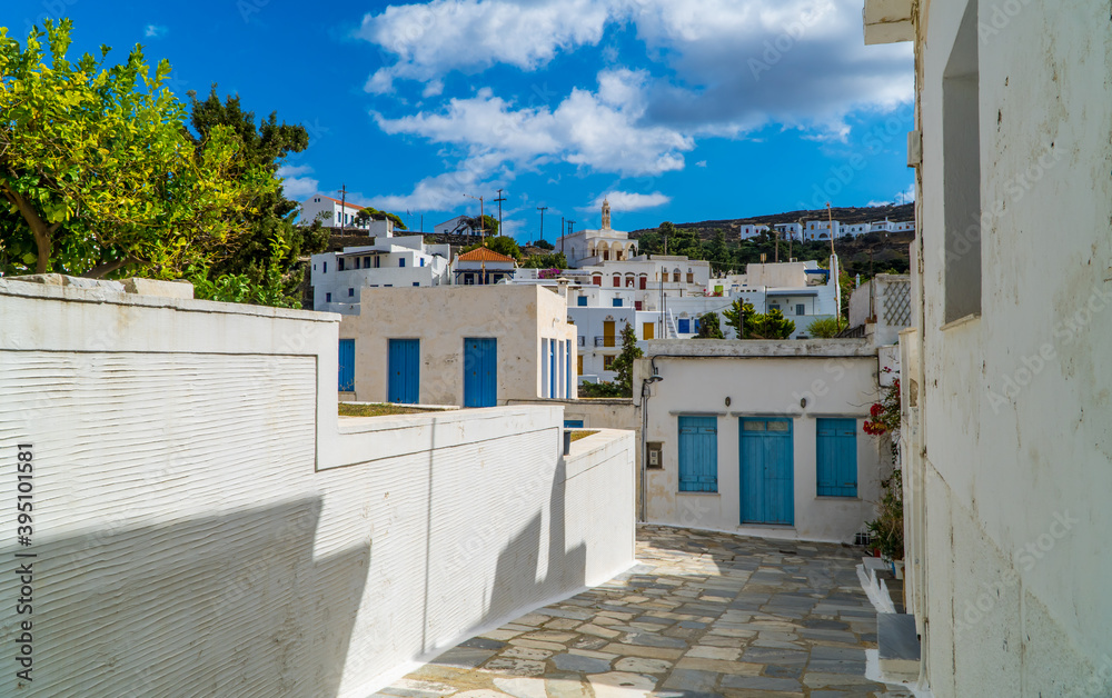 Typical white blue houses in the town of Pyrgos (Panormos) on the island of Tinos, Cyclades, Greece