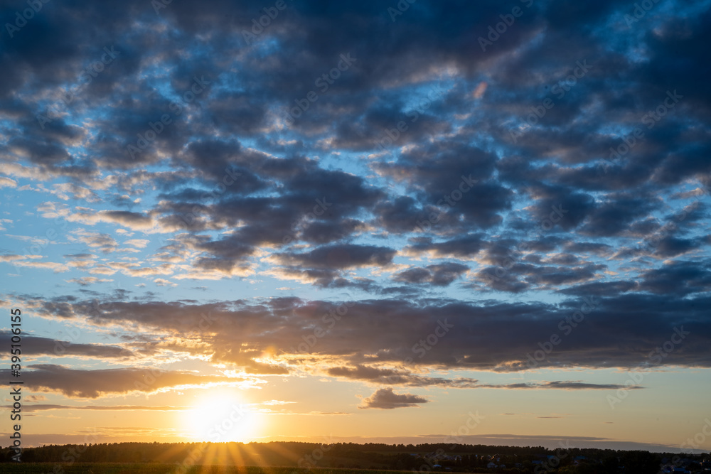 Beautiful textured sky with clouds at sunset Beautiful textured sky with clouds at sunset
