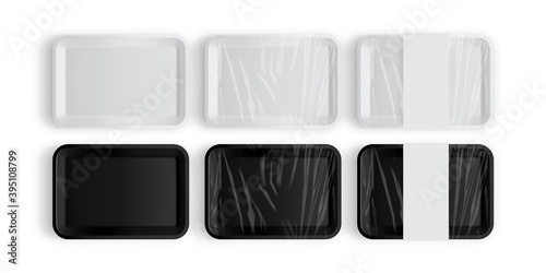 white and black tray packaging for food isolated on white background photo