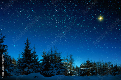 Christmas star on night abstract sky. Abstract Background. © Swetlana Wall