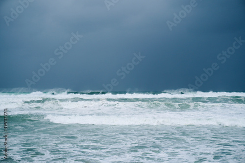 Fototapeta Naklejka Na Ścianę i Meble -  Waves on the ocean during a rainy and windy storm