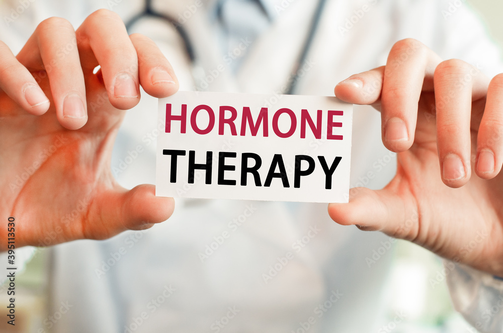 Doctor holding a card with text HORMONE THERAPY, medical concept Doctor holding a card with text HORMONE THERAPY, medical concept