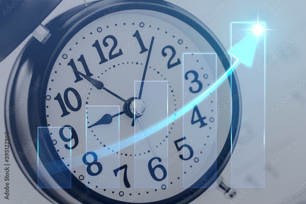 Classic alarm clock on business chart background Classic alarm clock on business chart background