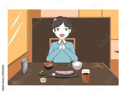 外食する男性　手を合わせる　夕方