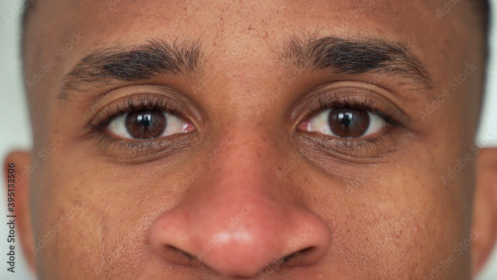 Fototapeta premium Close-up of a black man's eyes. Eyes of a thoughtful man
