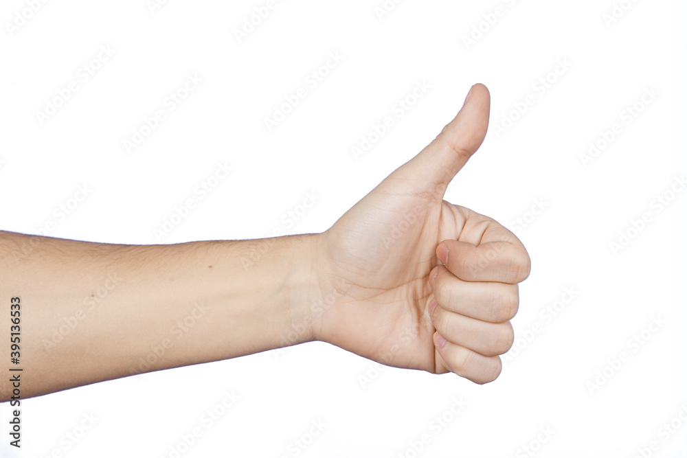 Mano con pulgar hacia arriba con señal positiva foto de Stock | Adobe Stock