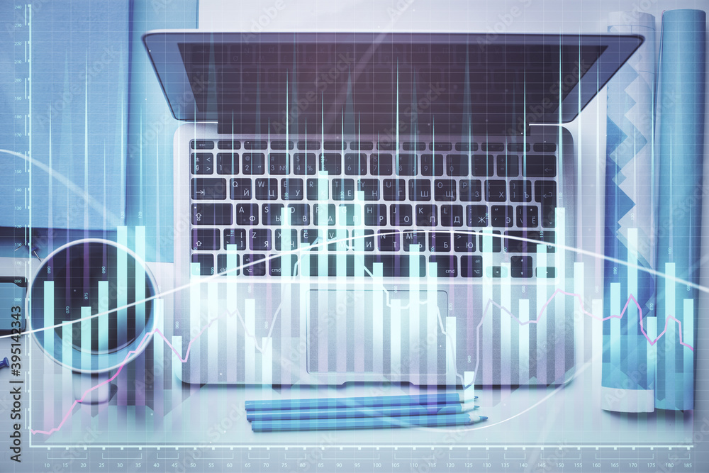 Double exposure of forex graph drawing over desktop background with computer. Concept of financial analysis. Top view. Double exposure of forex graph drawing over desktop background with computer. Concept of financial analysis. Top view.