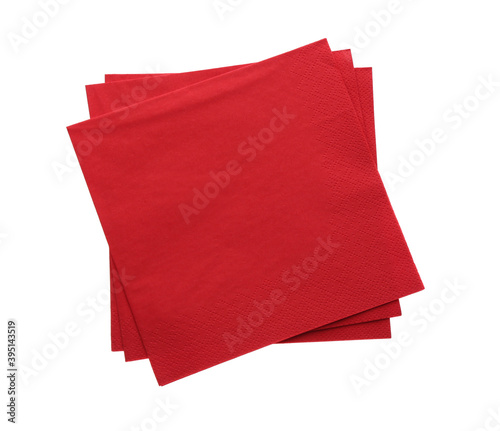 Stack of red clean paper tissues on white background, top view