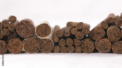 cigarillo and cigars in black background 4k