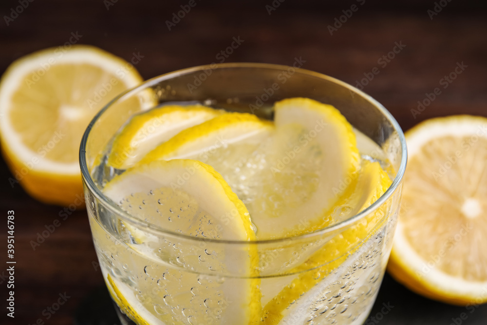 Fresh soda water with lemon slices, closeup Fresh soda water with lemon slices, closeup