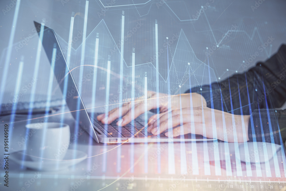 Double exposure of businesswoman hands typing on computer and forex graph hologram drawing. Financial analysis concept. Double exposure of businesswoman hands typing on computer and forex graph hologram drawing. Financial analysis concept.