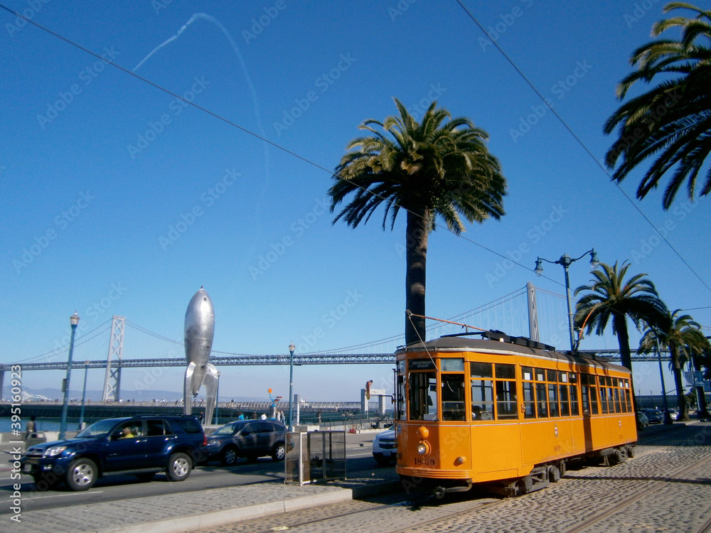 Orange historic streetcar of the F-Line MUNI Train, original from Milan ...